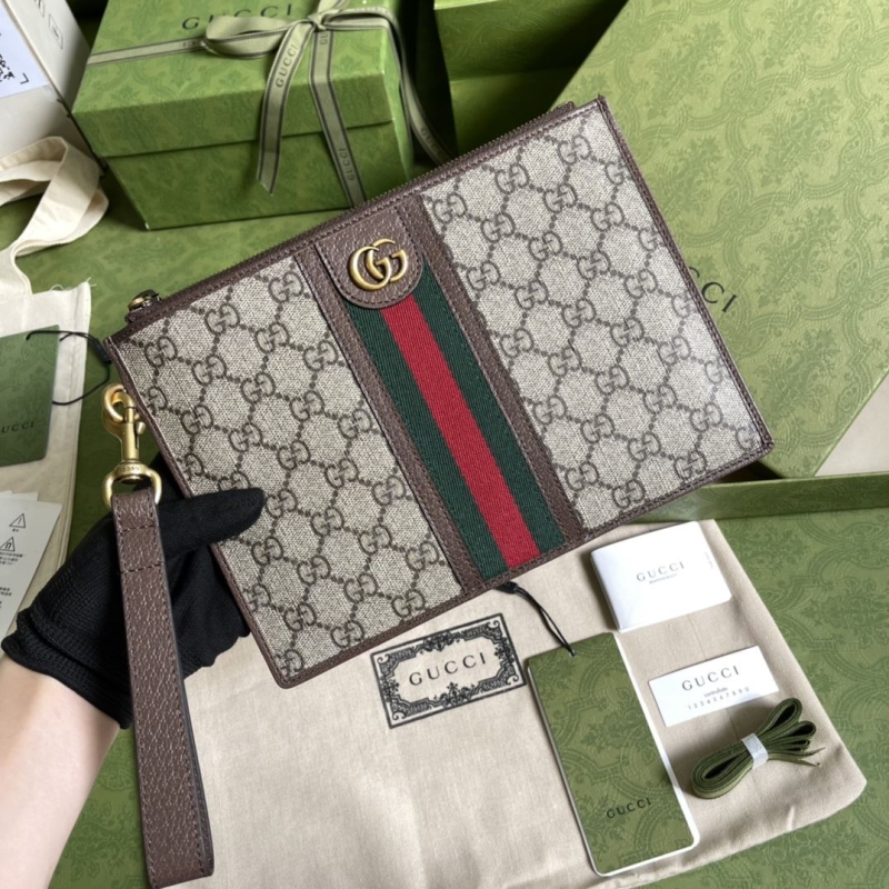 G*u*i clutch bags